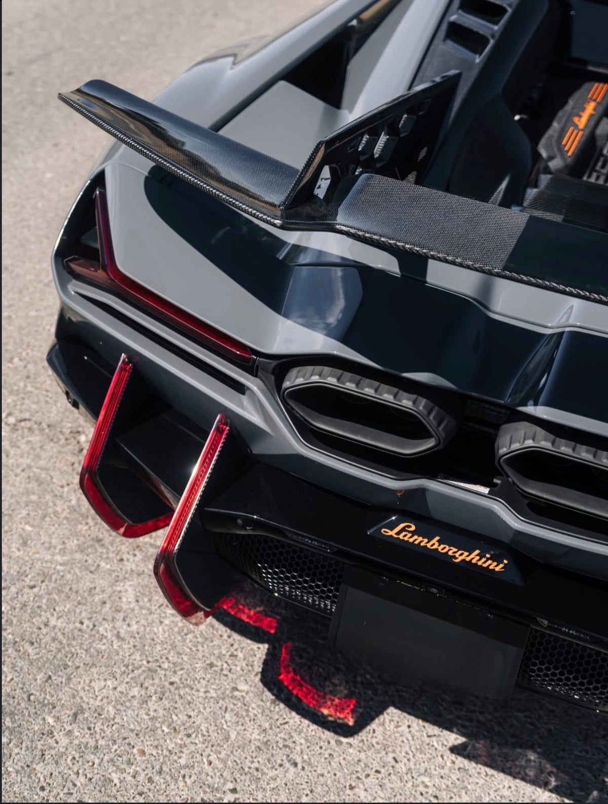 Lamborghini Revuelto – DK Style Carbon Fiber LED Rear Bumper Diffuser Canards