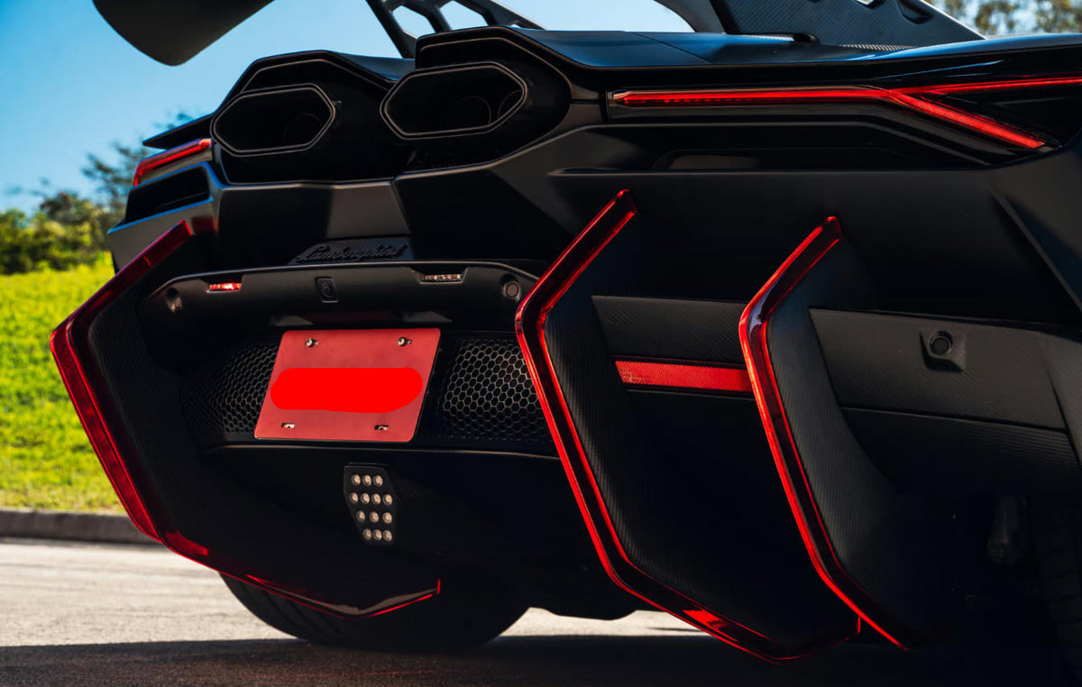 Lamborghini Revuelto – DK Style Carbon Fiber LED Rear Bumper Diffuser Canards