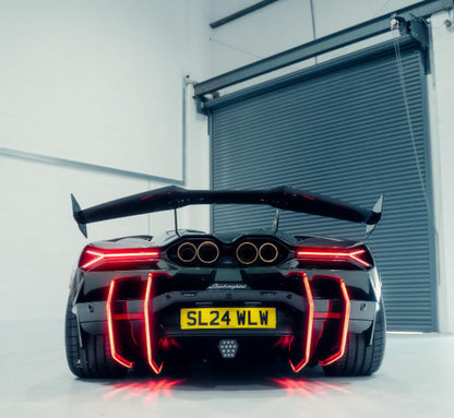 Lamborghini Revuelto – DK Style Carbon Fiber LED Rear Bumper Diffuser Canards