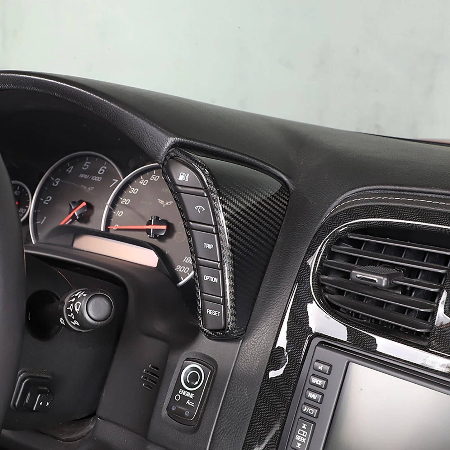 Chevrolet Corvette C6 (2005–2013) – Carbon Fiber Dashboard Console Button Frame Trim